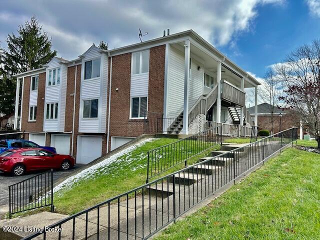 view of property exterior featuring a yard