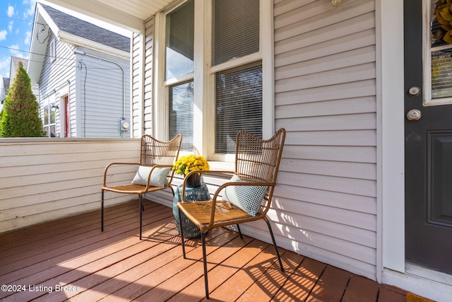 wooden deck featuring covered porch