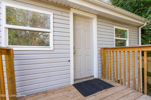 doorway to property featuring a deck