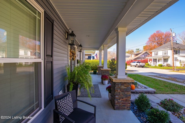 view of patio featuring a porch