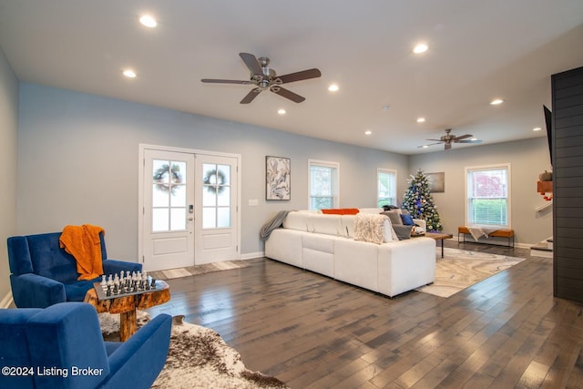 living room with french doors, dark hardwood / wood-style flooring, and ceiling fan