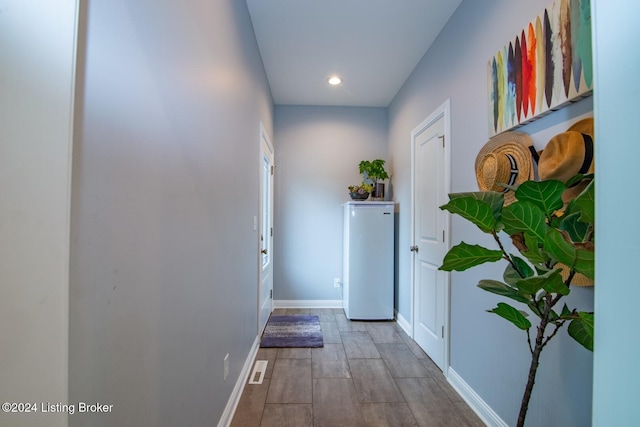 interior space with hardwood / wood-style flooring