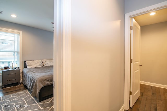 bedroom featuring dark hardwood / wood-style floors