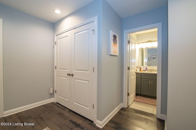 hall featuring dark wood-type flooring