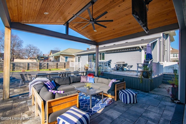 view of patio featuring a gazebo, outdoor lounge area, and ceiling fan