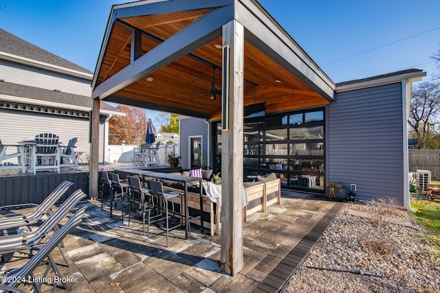 view of patio with an outdoor bar