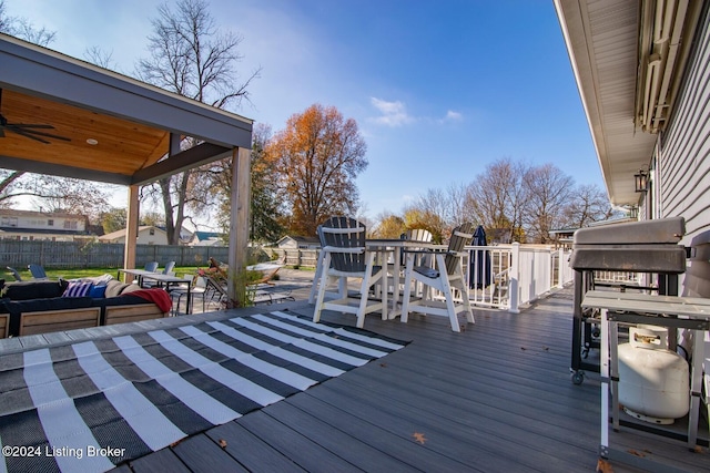 wooden deck with ceiling fan