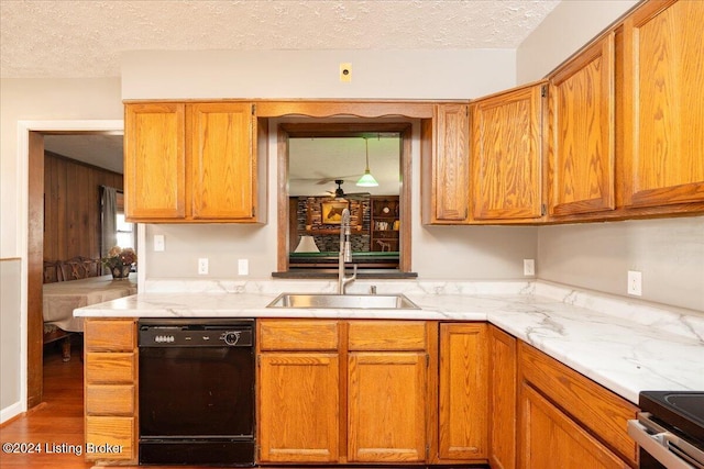 kitchen featuring dark wood-type flooring, stainless steel electric stove, sink, a textured ceiling, and black dishwasher