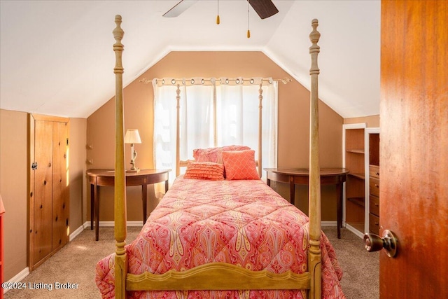 carpeted bedroom featuring ceiling fan and lofted ceiling