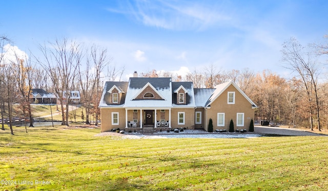 view of front of home with a front lawn and covered porch