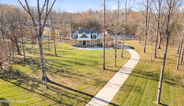 view of yard featuring covered porch