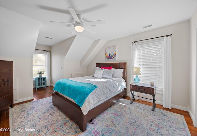 bedroom with hardwood / wood-style floors, ceiling fan, and lofted ceiling