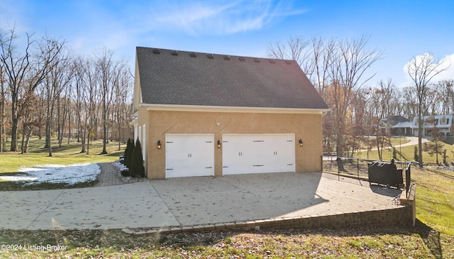 garage with a lawn