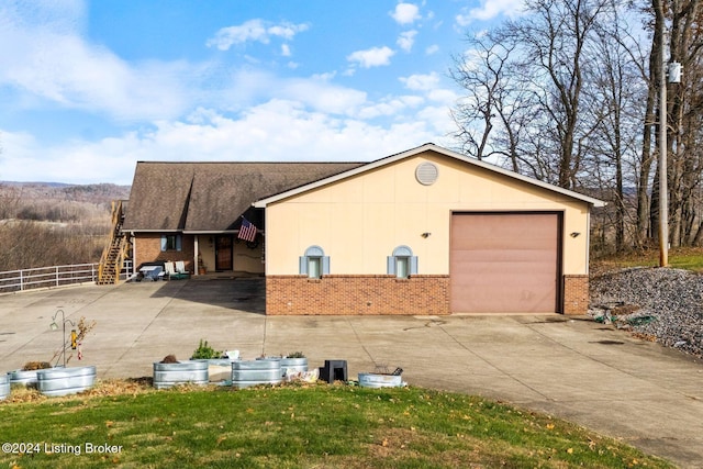 view of home's exterior with a garage