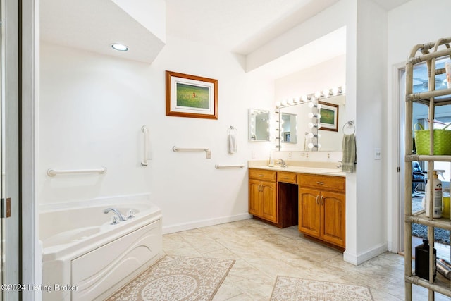 bathroom with a tub to relax in and vanity