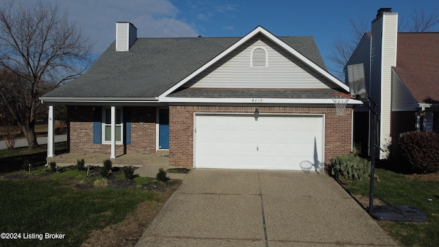 view of front of property featuring a garage