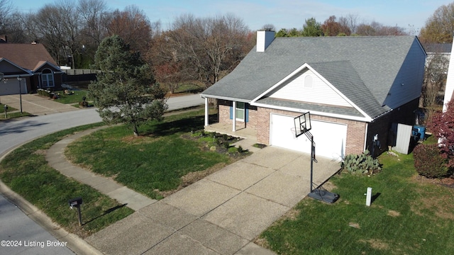 view of property exterior featuring a yard and a garage