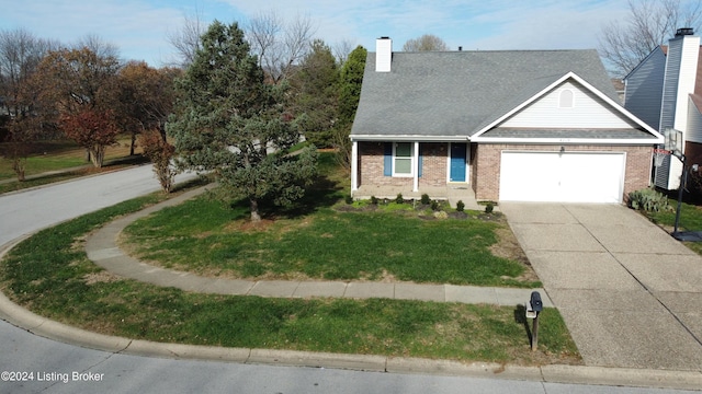 view of front facade featuring a front yard and a garage