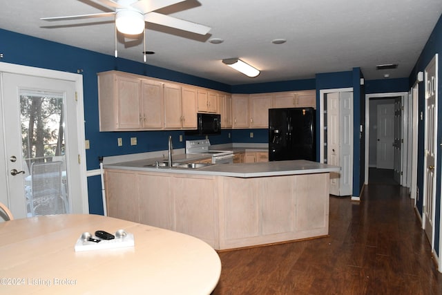 kitchen featuring black appliances, dark hardwood / wood-style flooring, sink, and light brown cabinetry