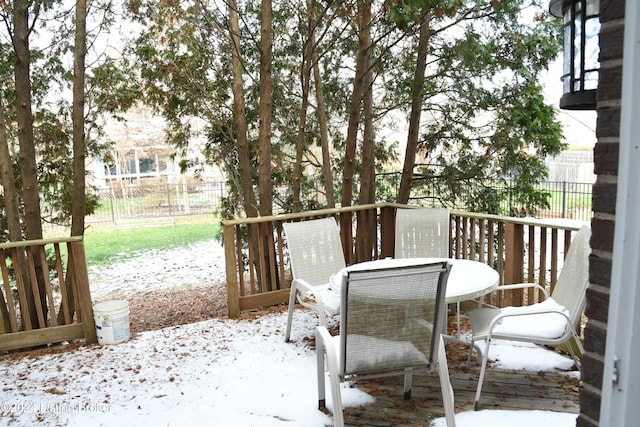 view of snow covered deck