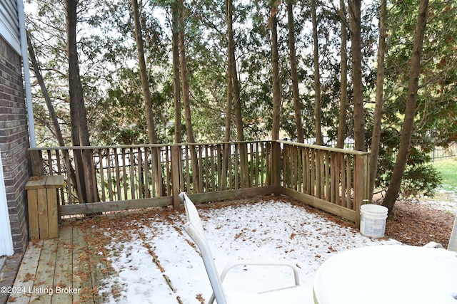 view of snow covered deck