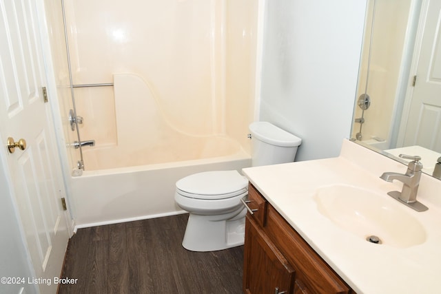 full bathroom with wood-type flooring, vanity, toilet, and shower / washtub combination