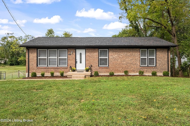 single story home with a front yard