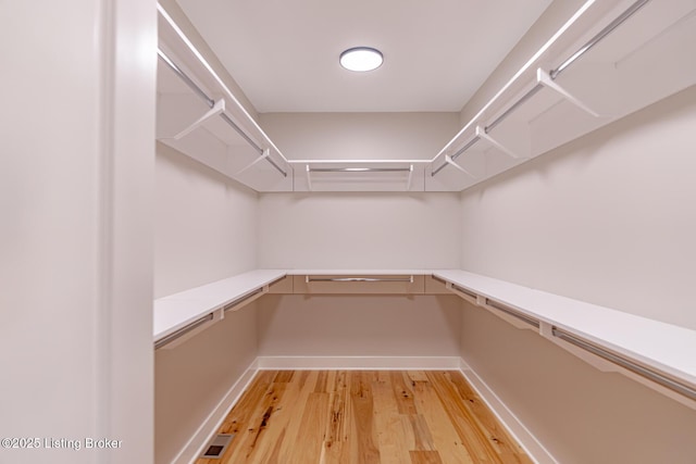 spacious closet with visible vents and light wood finished floors