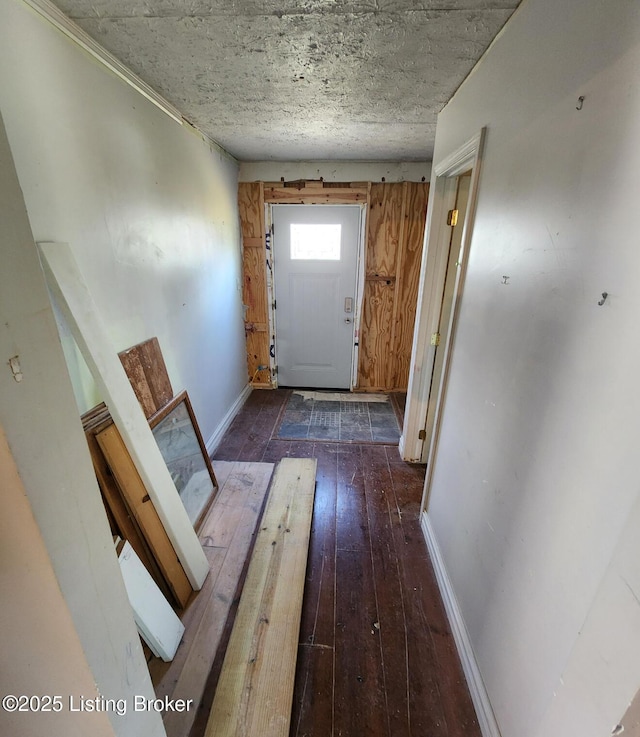 doorway to outside with dark hardwood / wood-style floors