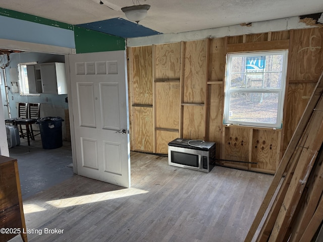 empty room with hardwood / wood-style floors