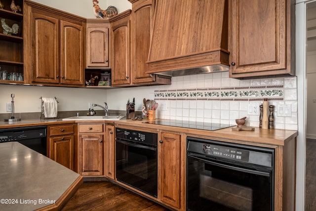 kitchen with backsplash, black appliances, sink, dark hardwood / wood-style floors, and custom range hood