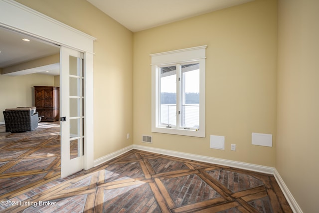 spare room with french doors