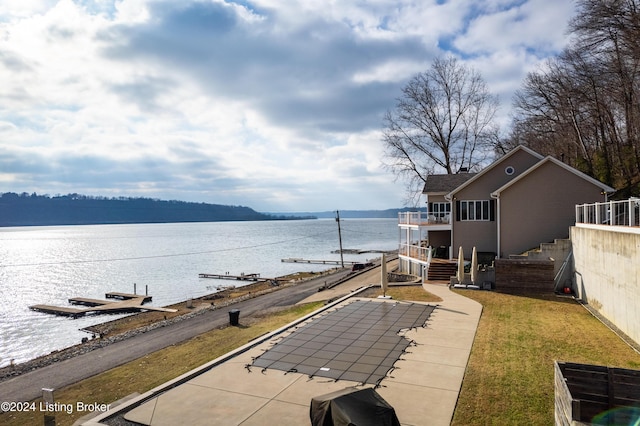 view of patio / terrace featuring a water view