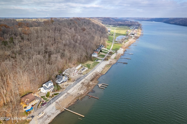 birds eye view of property featuring a water view