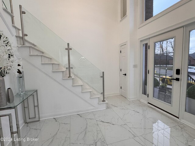 foyer with a high ceiling