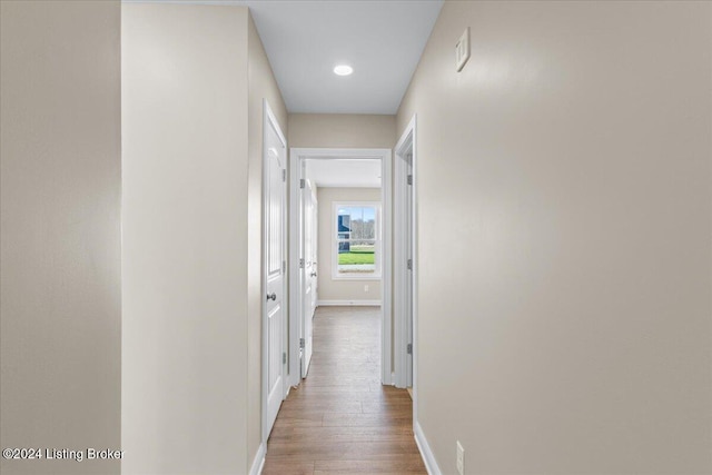 corridor featuring light hardwood / wood-style flooring