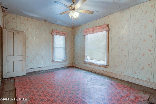 unfurnished room featuring ceiling fan