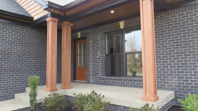 entrance to property with covered porch