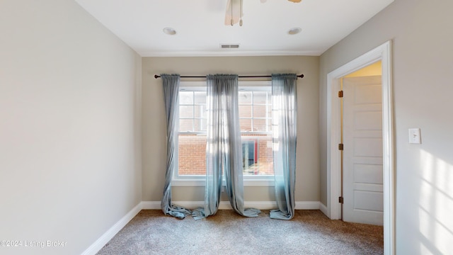 unfurnished room featuring carpet flooring