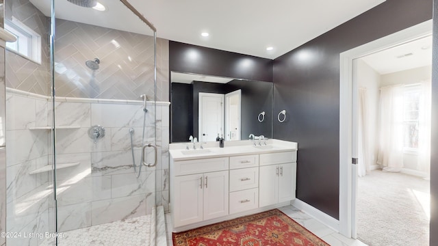 bathroom with vanity and an enclosed shower