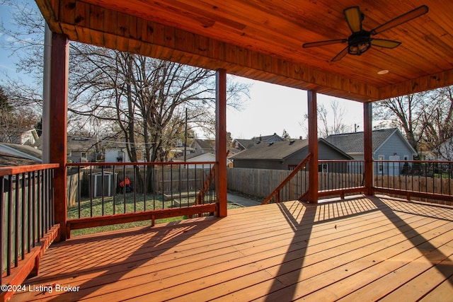 wooden deck featuring ceiling fan