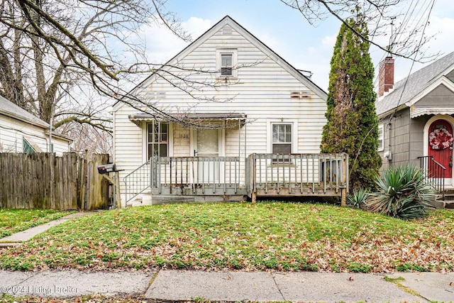 view of front of property with a front lawn