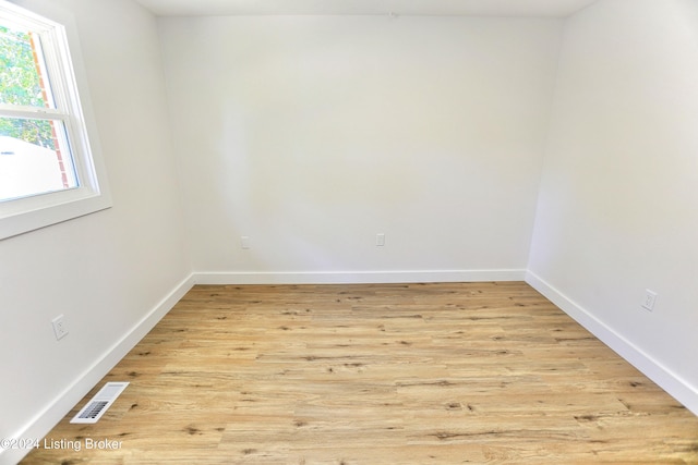 unfurnished room featuring light hardwood / wood-style flooring