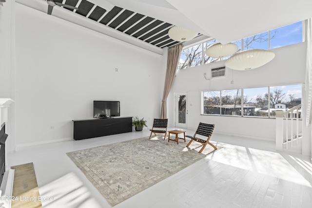 living room with a towering ceiling