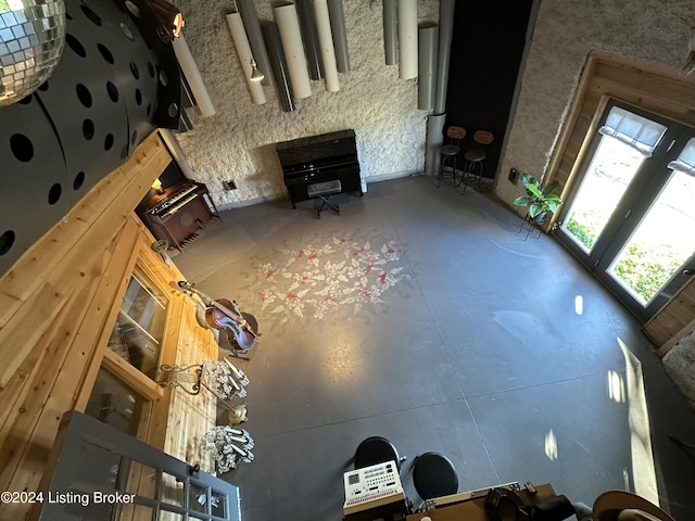 unfurnished living room with plenty of natural light