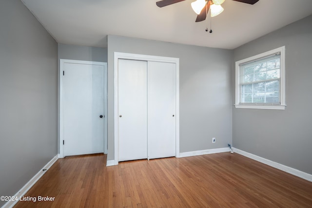 unfurnished bedroom featuring light hardwood / wood-style floors and ceiling fan