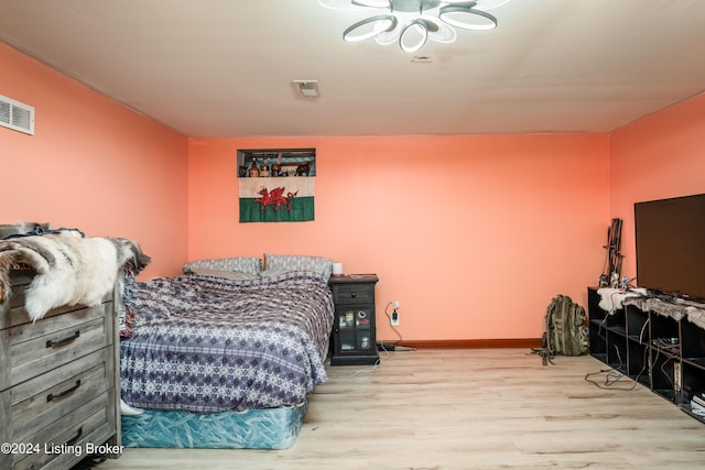 bedroom featuring light wood-type flooring