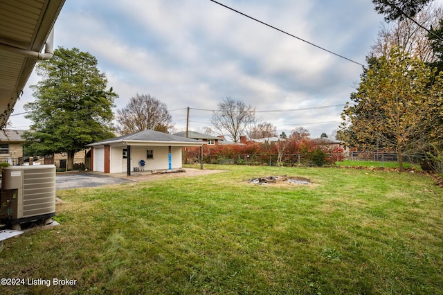 view of yard with central AC