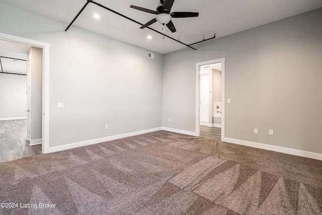 unfurnished room featuring carpet and ceiling fan