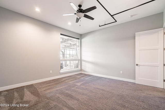 carpeted empty room with ceiling fan